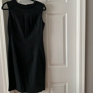 D&G Dolce & Gabbana sleeveless,black dress. Very simple , classy. Perfect!